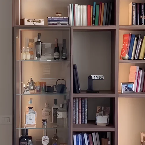 LIBRERIA ANGOLARE SU MISURA IN LEGNO MASSELLO